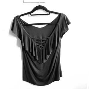 Black slightly off the shoulder shirt